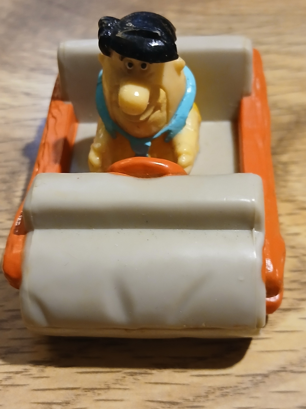 Vintage-Style Fred Flintstone Car with Beige and Orange Colors